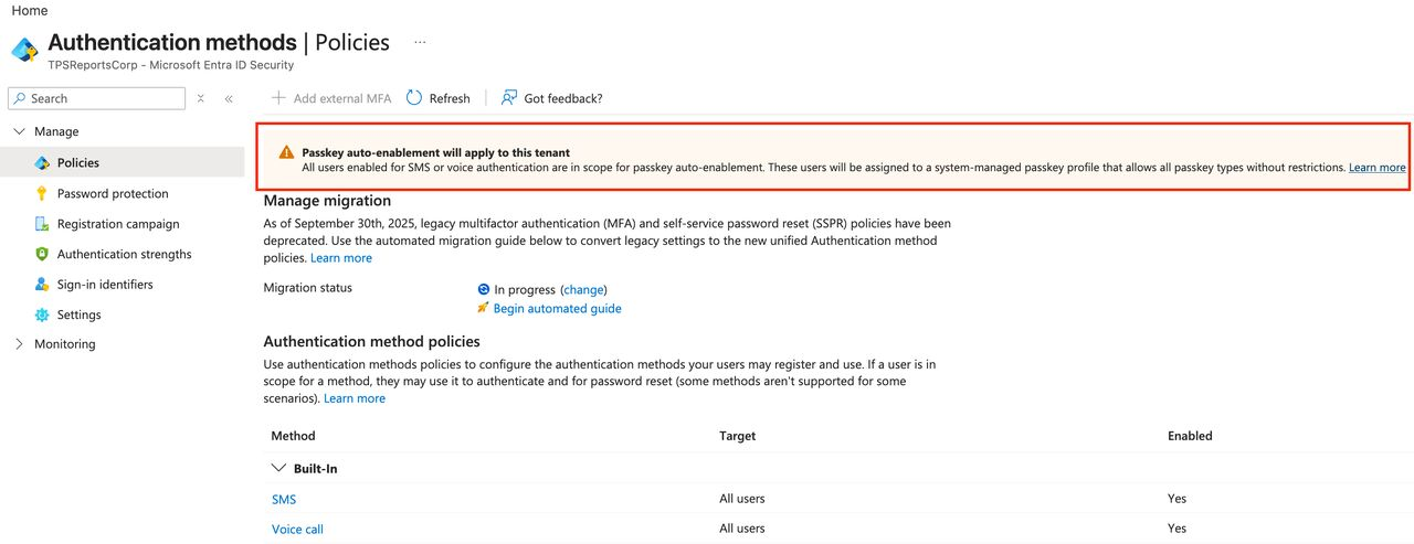Entra Authentication methods Policies page showing the banner: Passkey auto-enablement will apply to this tenant. All users enabled for SMS or voice authentication are in scope for passkey auto-enablement.
